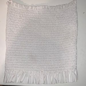 White tube top with ruffle detail at bottom!